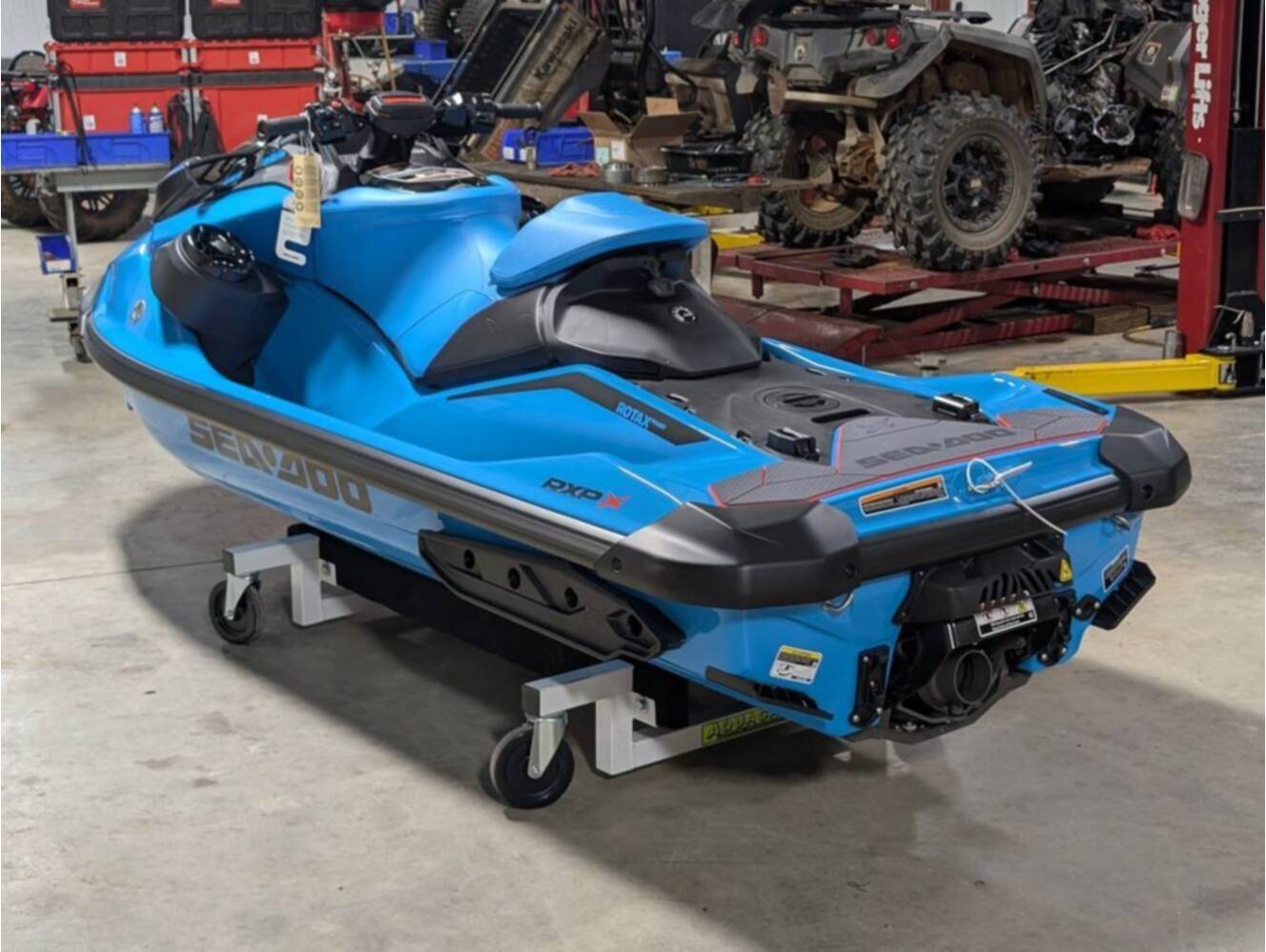 A photo of this 2026 Sea-Doo RXP-X 325 Tech, BRP Premium A, iBR Gulfstream Blue P