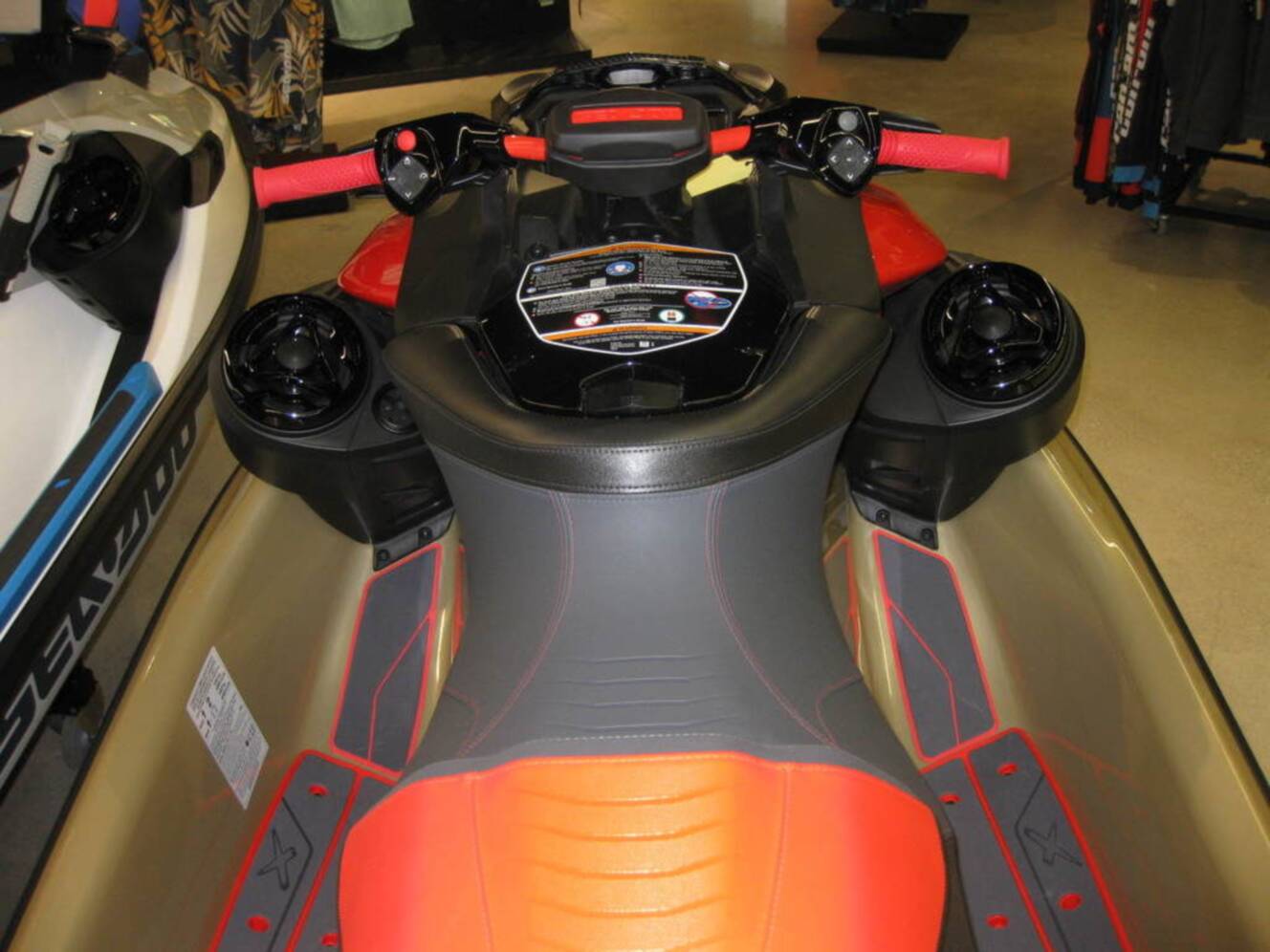 A photo of this 2025 Sea-Doo RXP-X 325 Tech, BRP Premium A, iBR Metallic Tan / La