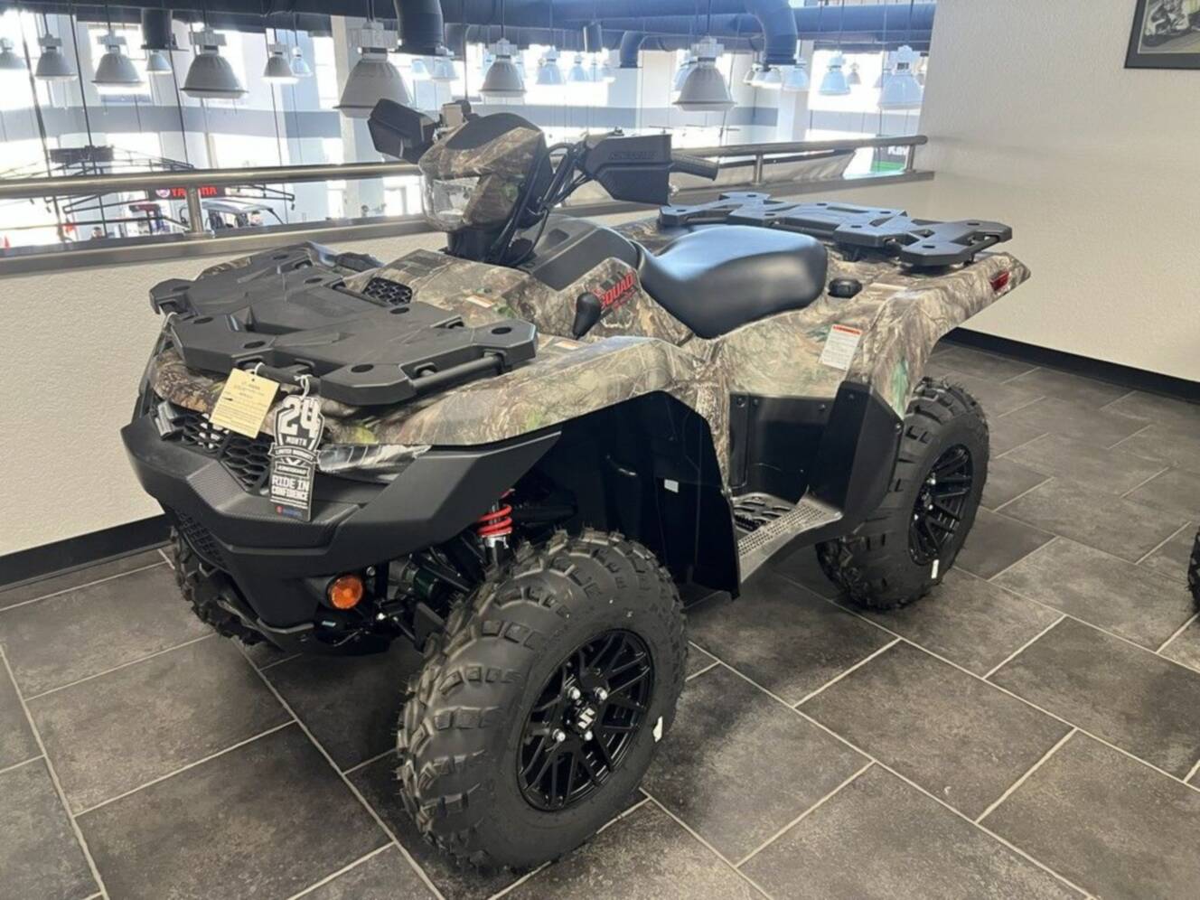 A photo of this 2025 Suzuki KingQuad 500AXi Power Steering SE Camo