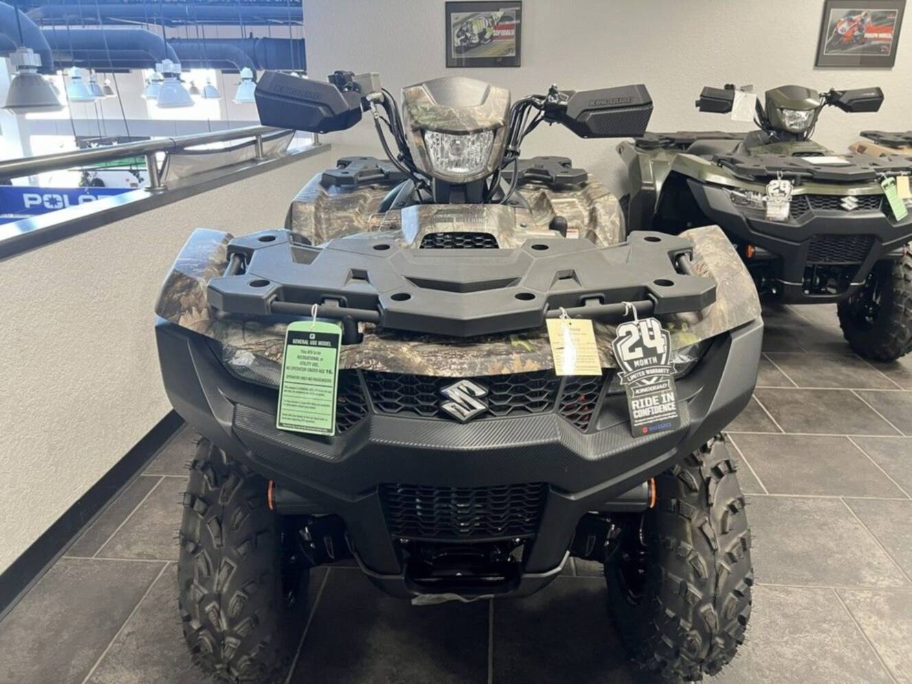 A photo of this 2025 Suzuki KingQuad 500AXi Power Steering SE Camo