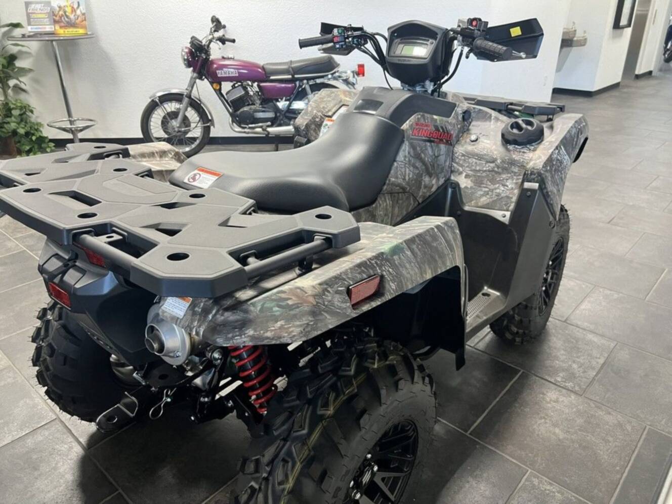 A photo of this 2025 Suzuki KingQuad 500AXi Power Steering SE Camo