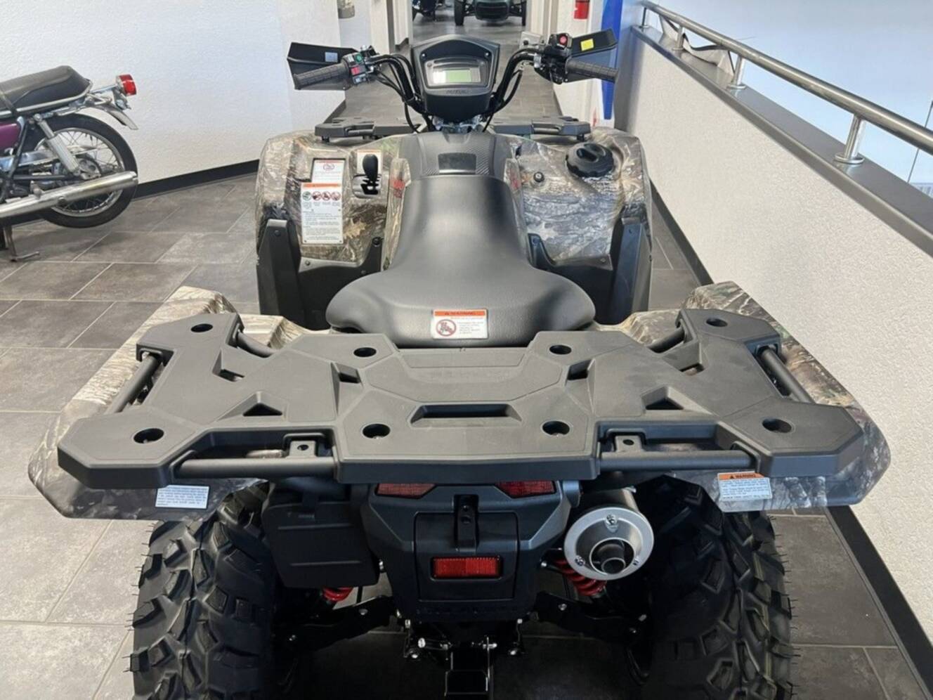 A photo of this 2025 Suzuki KingQuad 500AXi Power Steering SE Camo