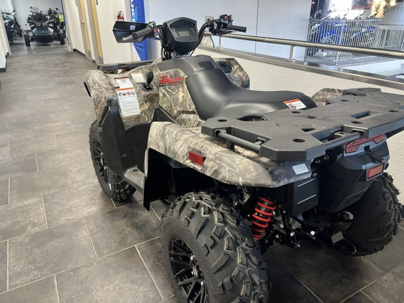 A photo of this 2025 Suzuki KingQuad 500AXi Power Steering SE Camo