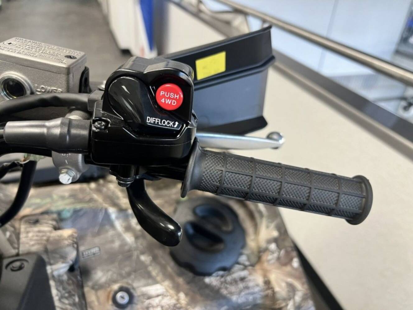 A photo of this 2025 Suzuki KingQuad 500AXi Power Steering SE Camo