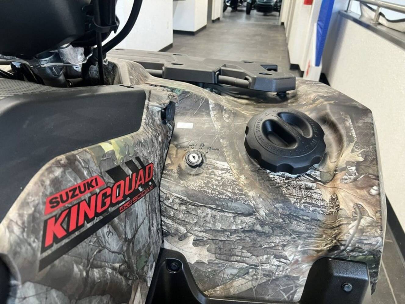 A photo of this 2025 Suzuki KingQuad 500AXi Power Steering SE Camo