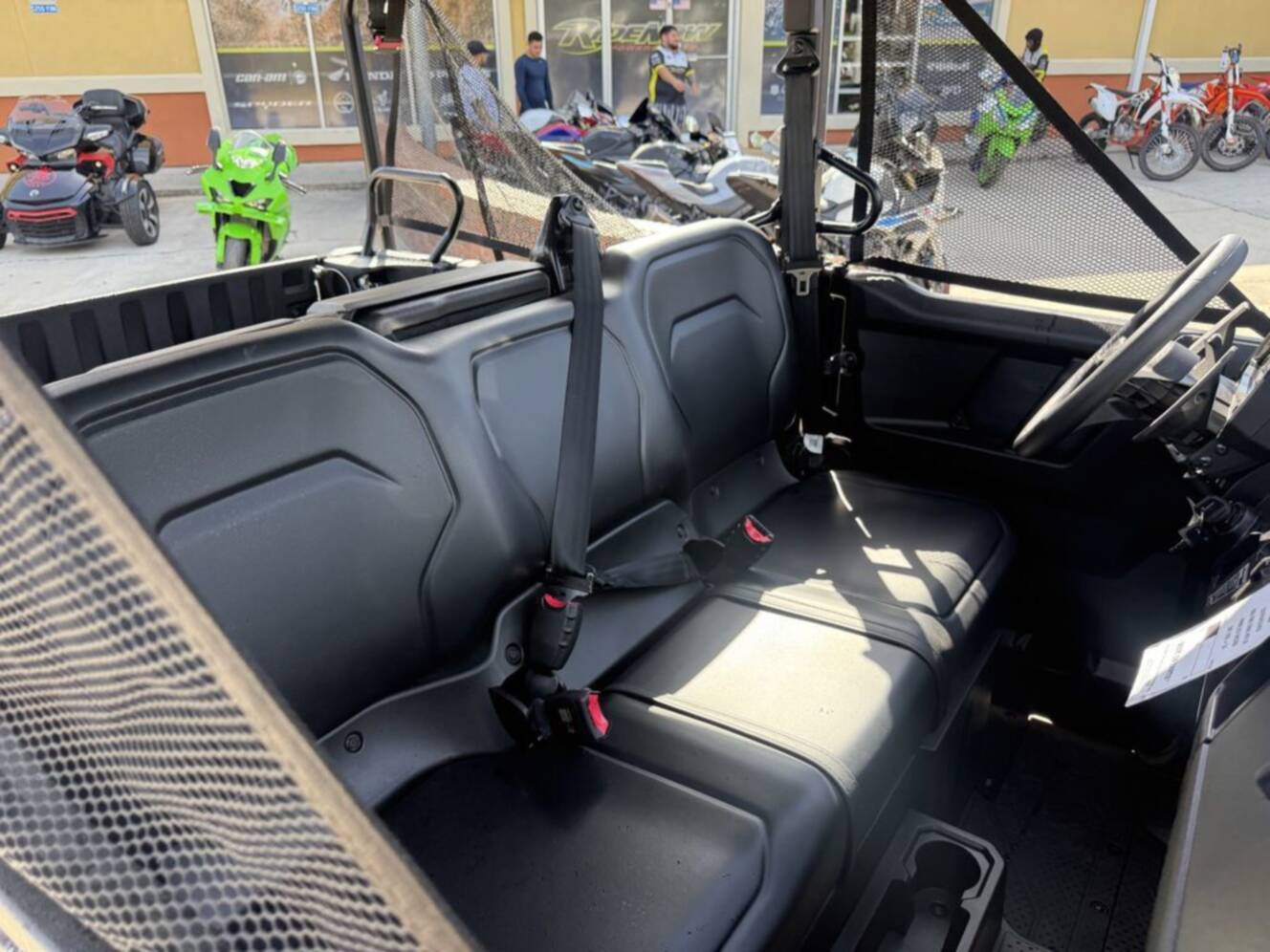 A photo of this 2026 Honda Pioneer 1000-5 Deluxe TrueTimber Atera Camo Deluxe