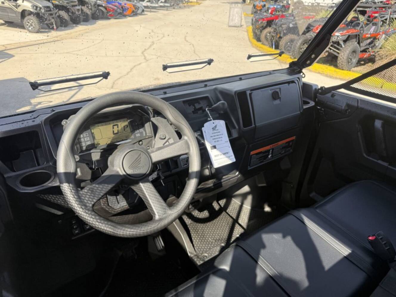 A photo of this 2026 Honda Pioneer 1000-5 Deluxe TrueTimber Atera Camo Deluxe