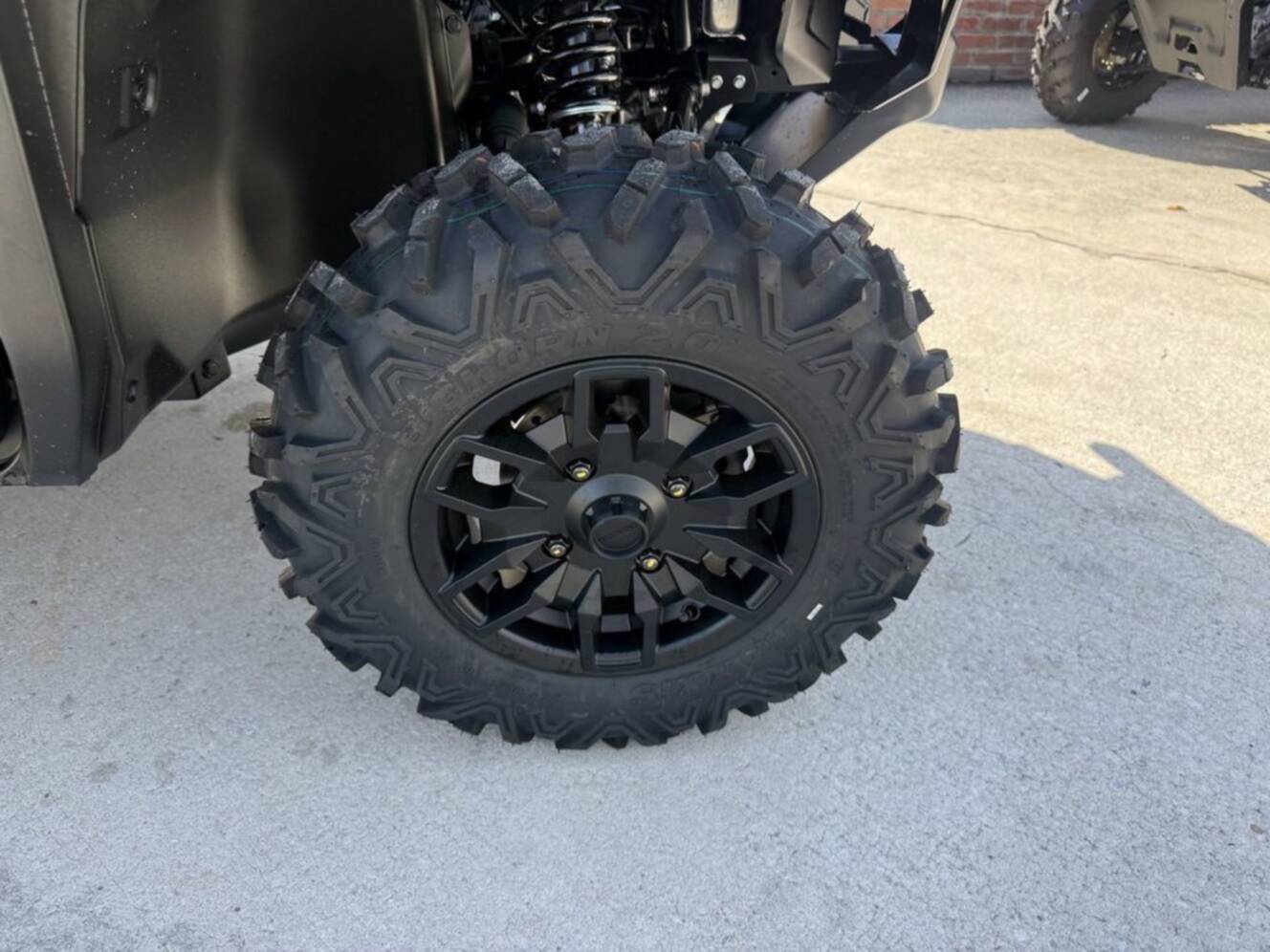 A photo of this 2026 Honda Pioneer 1000-5 Deluxe TrueTimber Atera Camo Deluxe