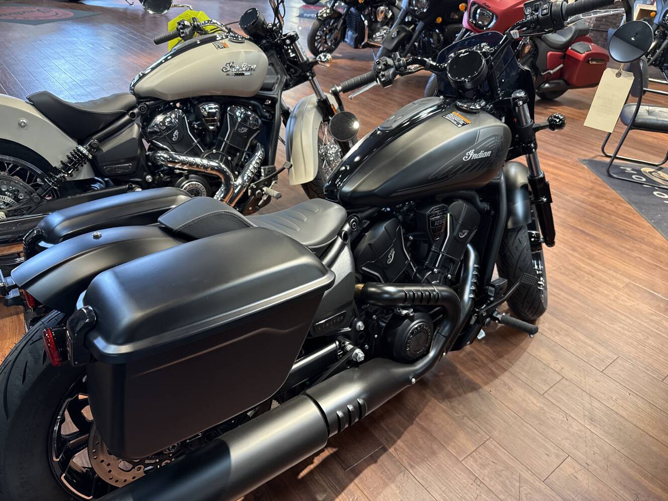 A photo of this 2026 Indian SPORT SCOUT RT, ONYX BLACK SMOKE, 49ST