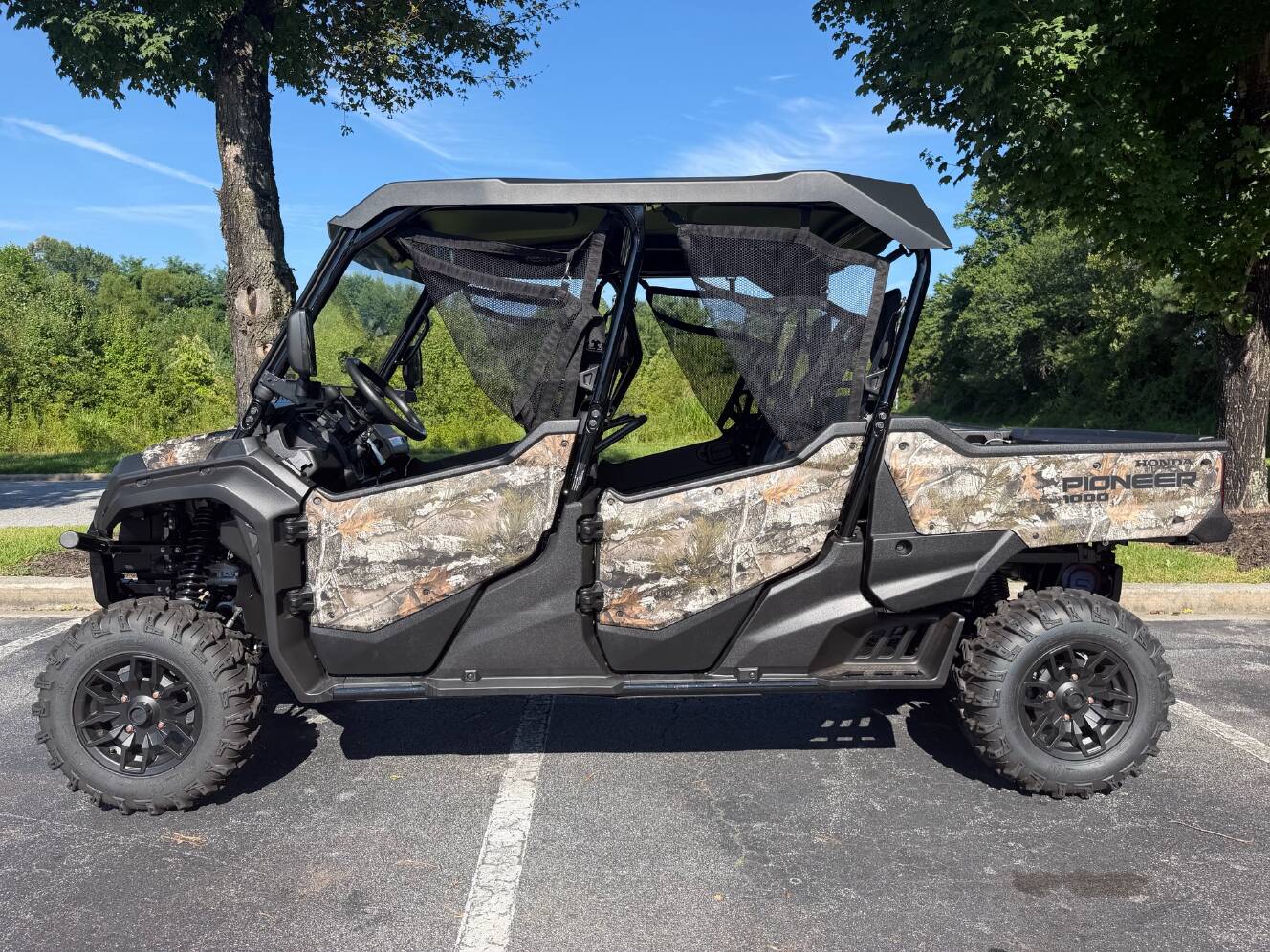 A photo of this 2025 Honda Pioneer 1000-6 Deluxe Crew