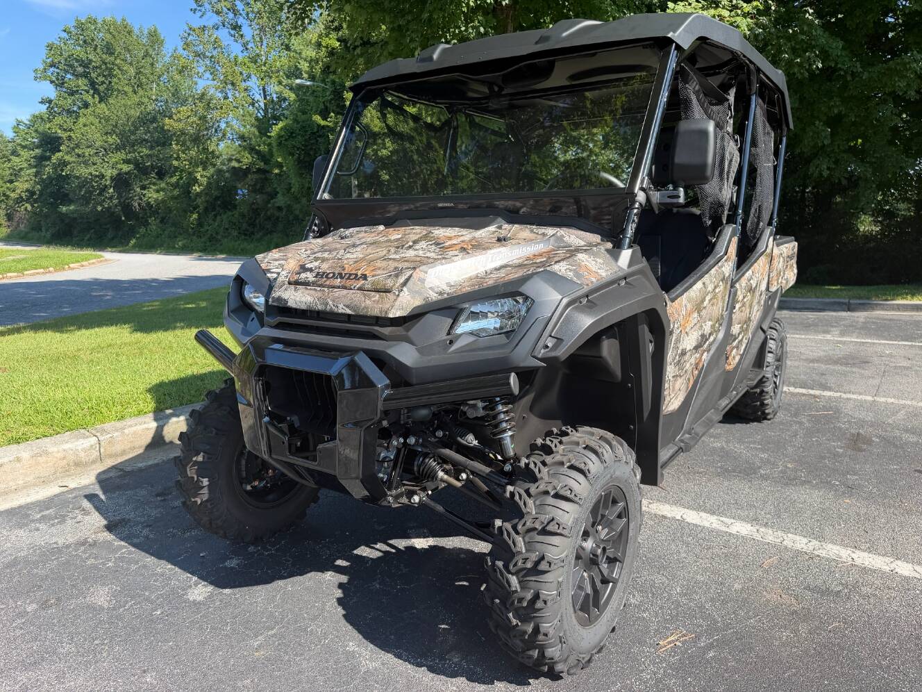 A photo of this 2025 Honda Pioneer 1000-6 Deluxe Crew