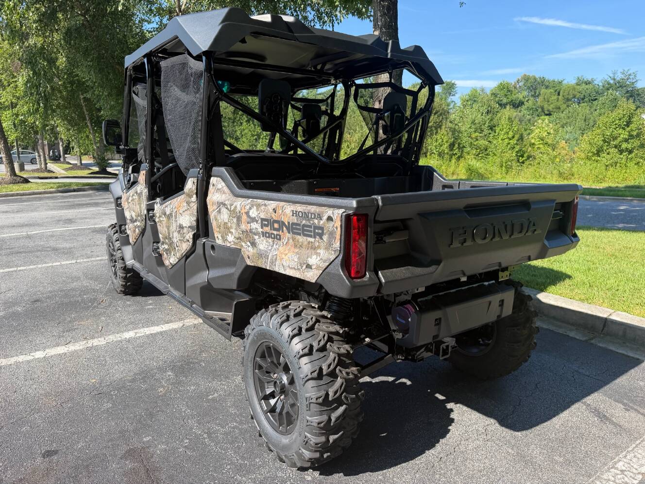 A photo of this 2025 Honda Pioneer 1000-6 Deluxe Crew