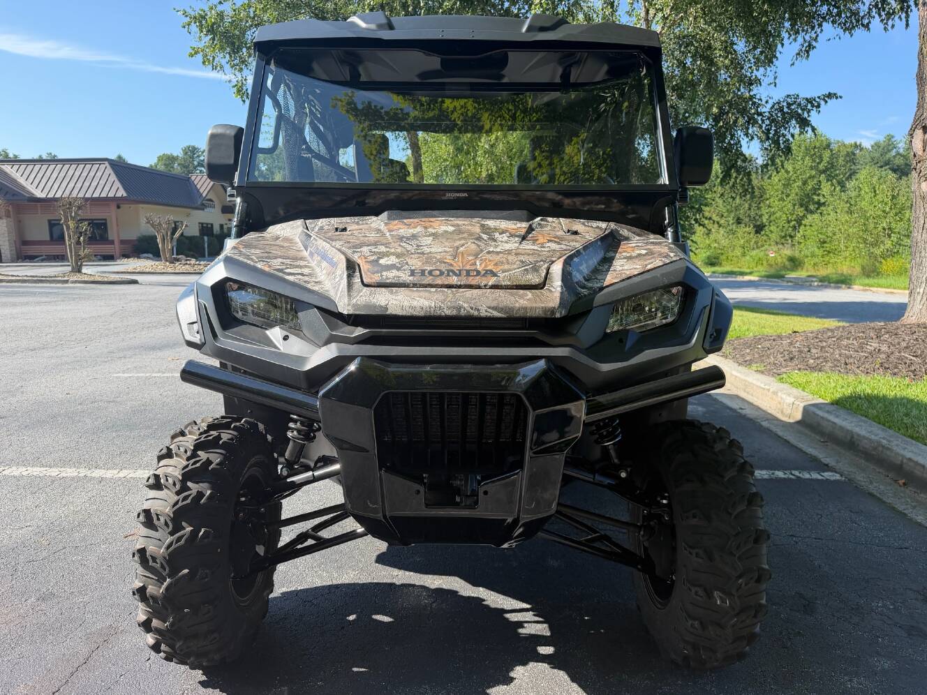 A photo of this 2025 Honda Pioneer 1000-6 Deluxe Crew