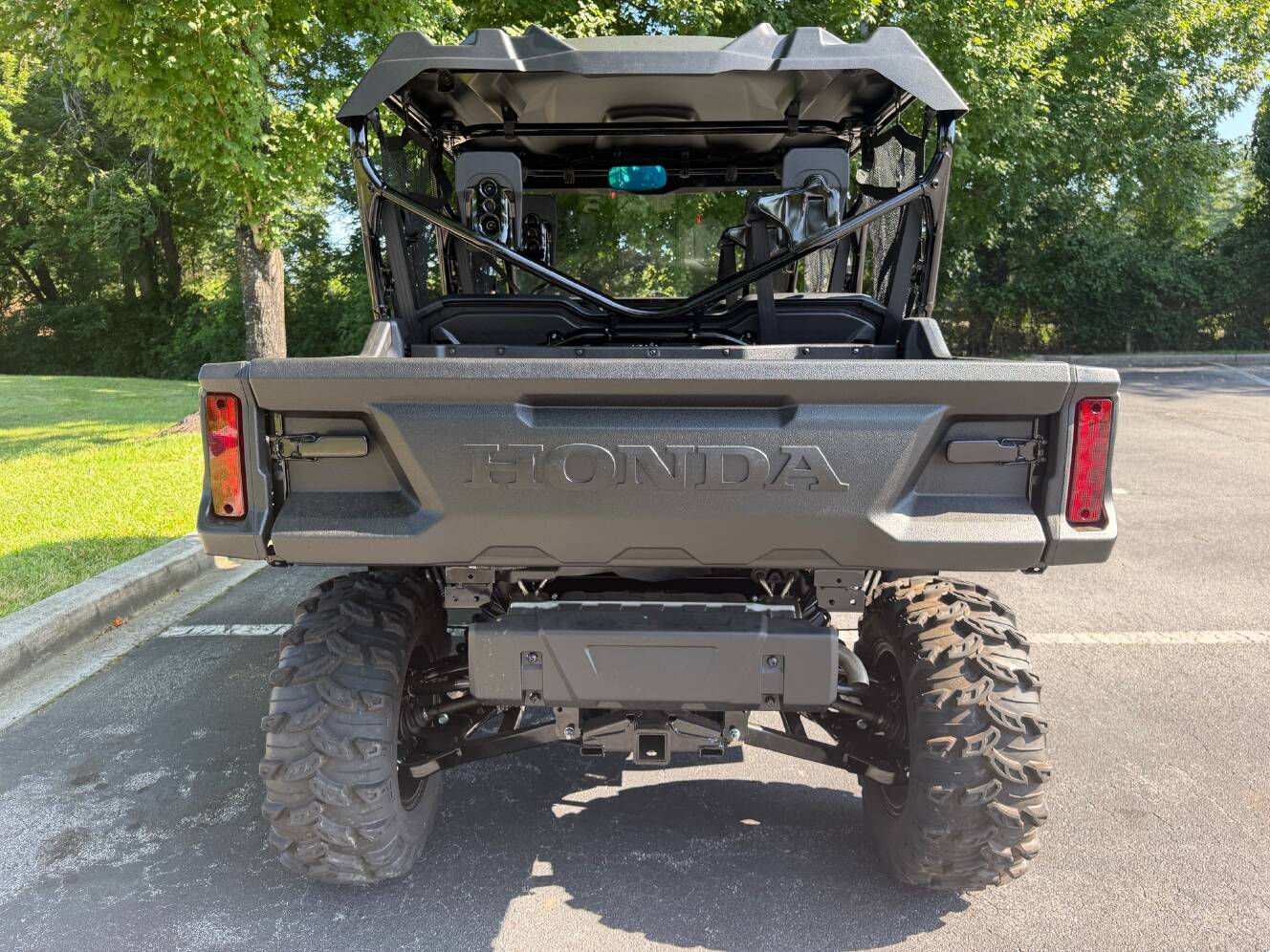 A photo of this 2025 Honda Pioneer 1000-6 Deluxe Crew