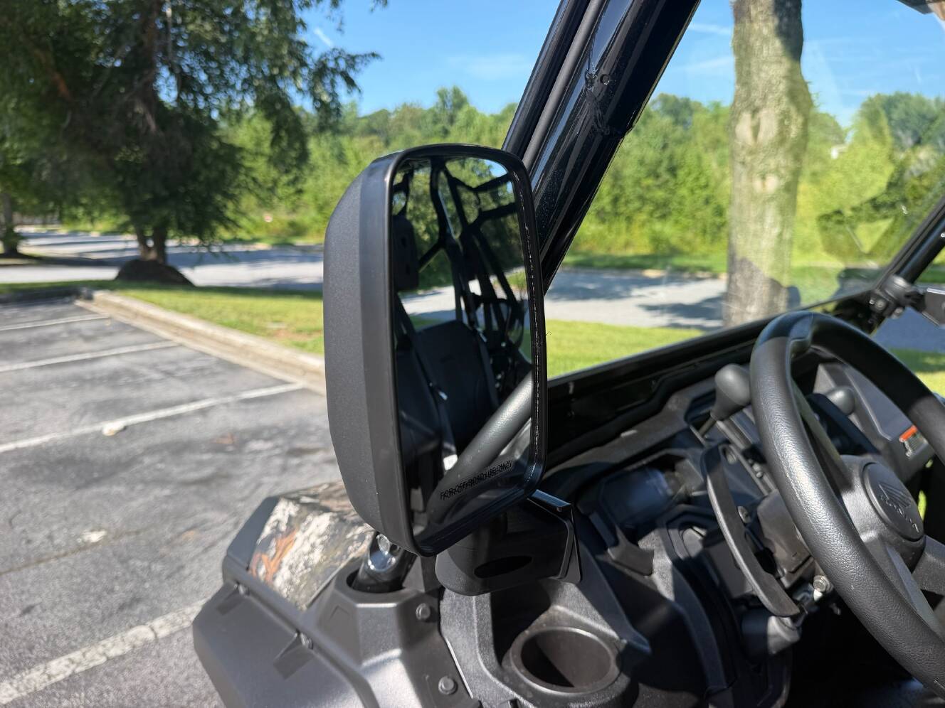 A photo of this 2025 Honda Pioneer 1000-6 Deluxe Crew