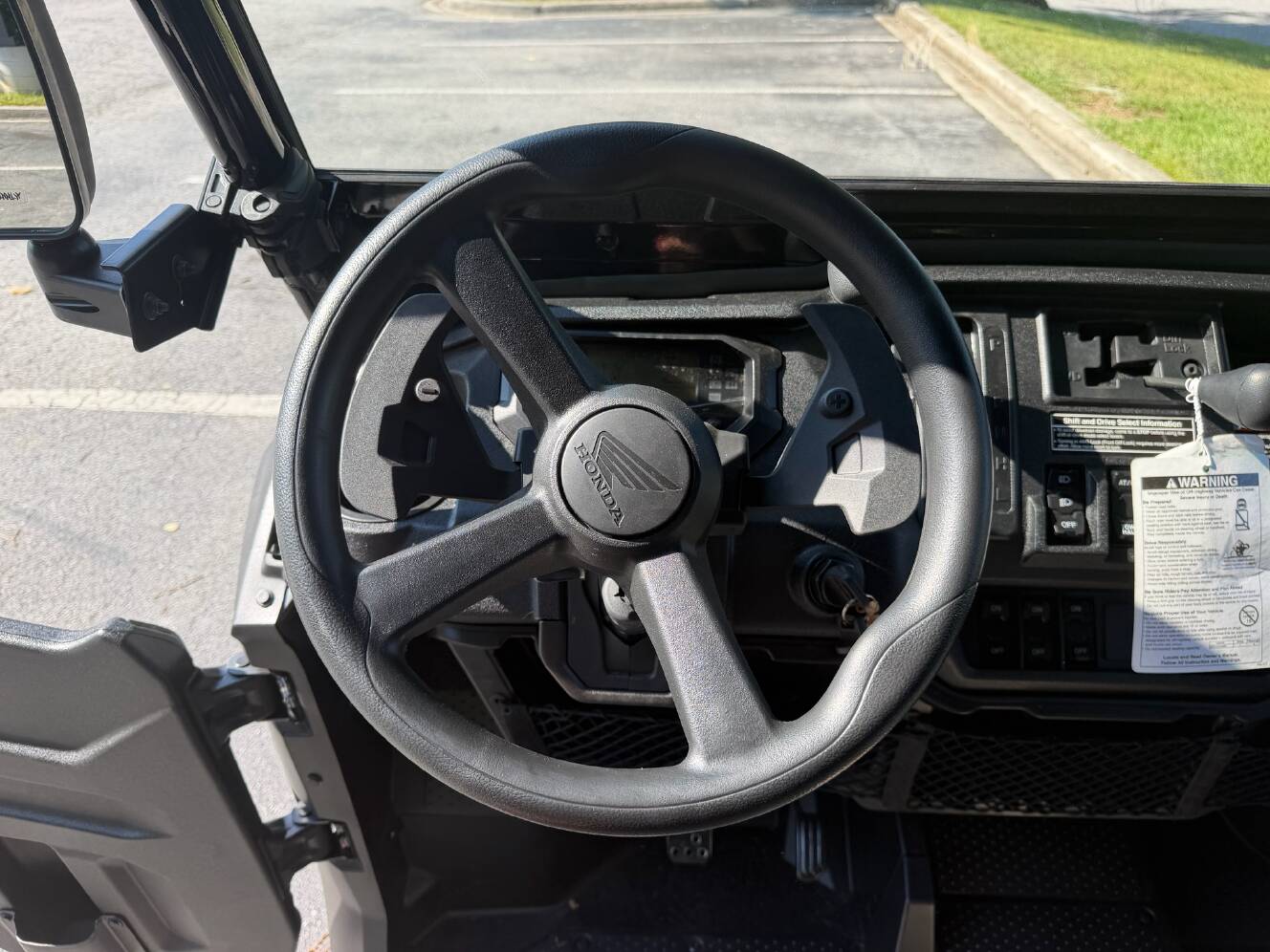 A photo of this 2025 Honda Pioneer 1000-6 Deluxe Crew