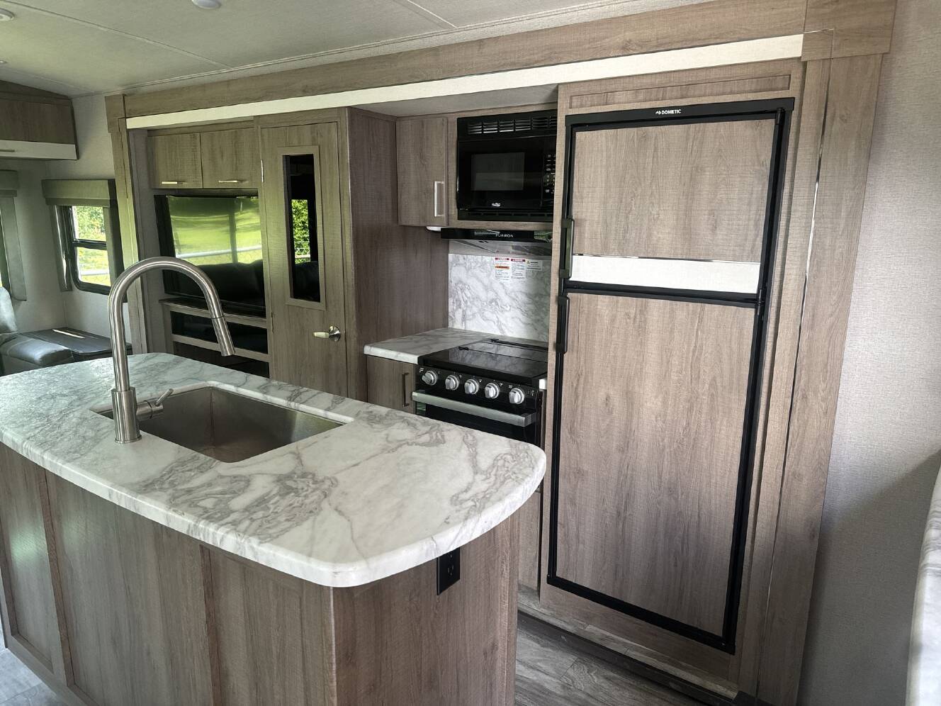 A photo of this 2022 Grand Design Imagine 2970RL