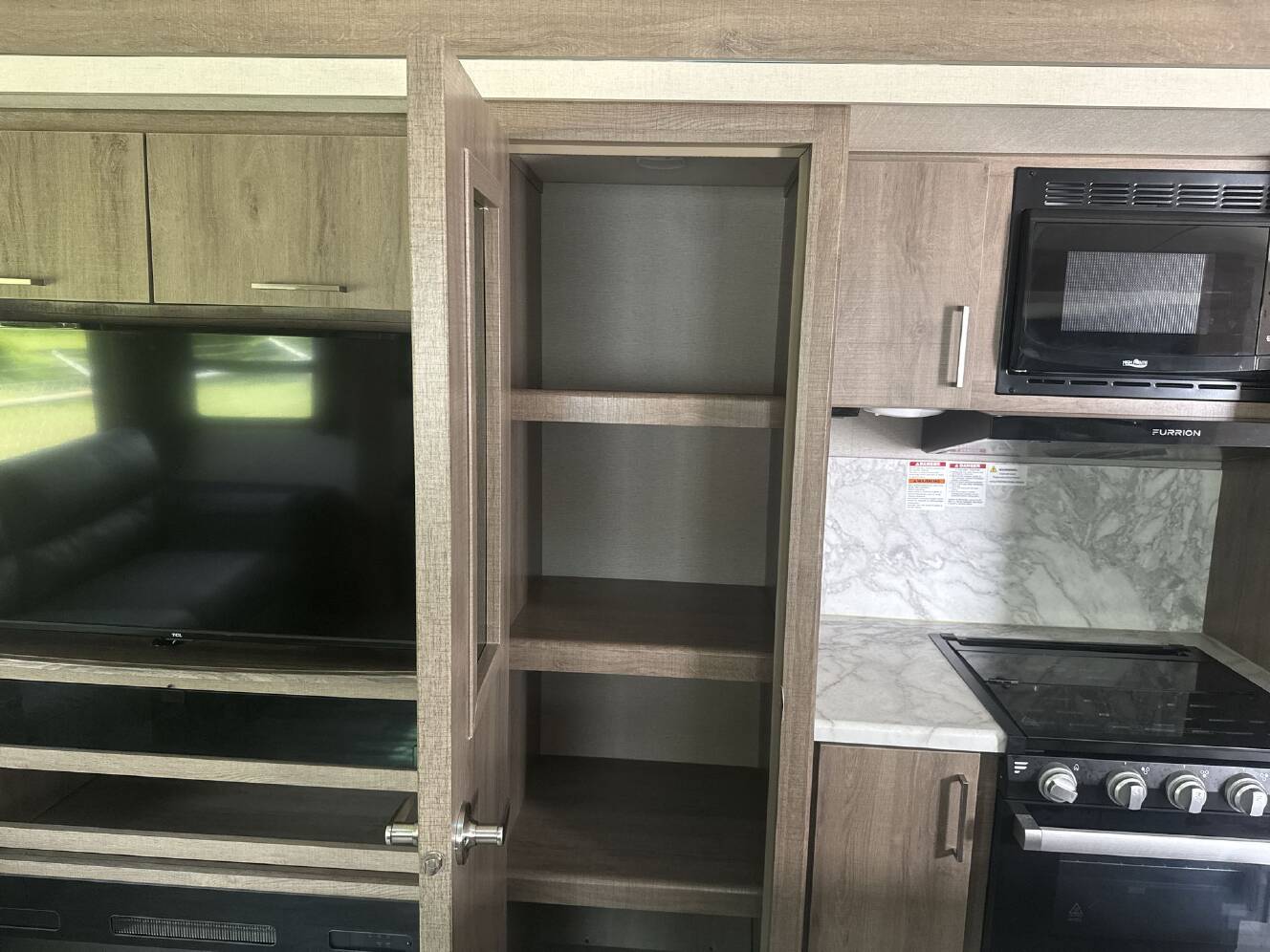 A photo of this 2022 Grand Design Imagine 2970RL