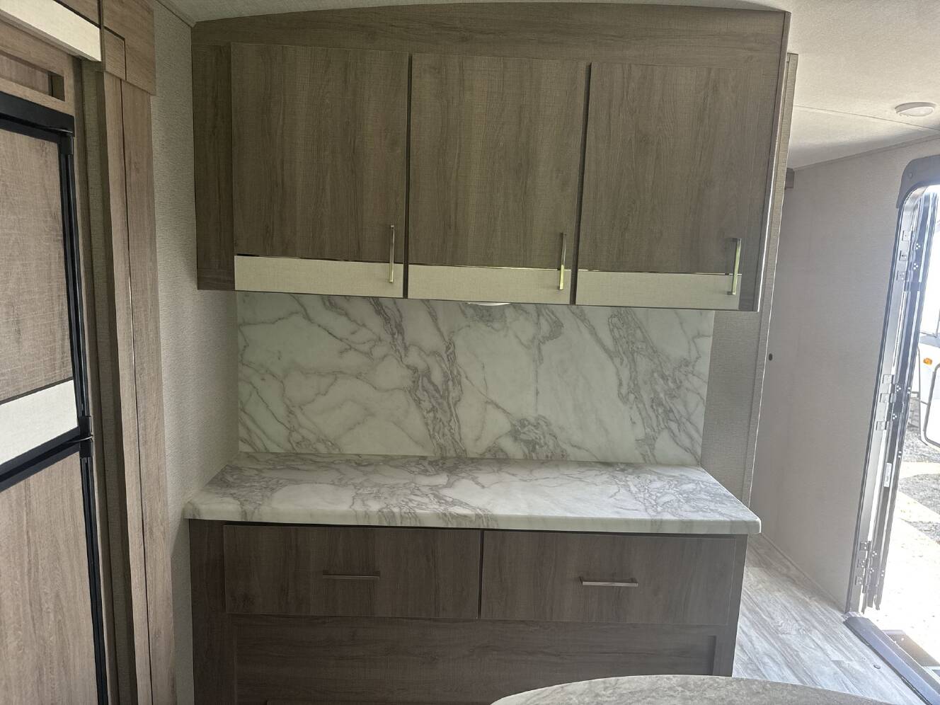 A photo of this 2022 Grand Design Imagine 2970RL