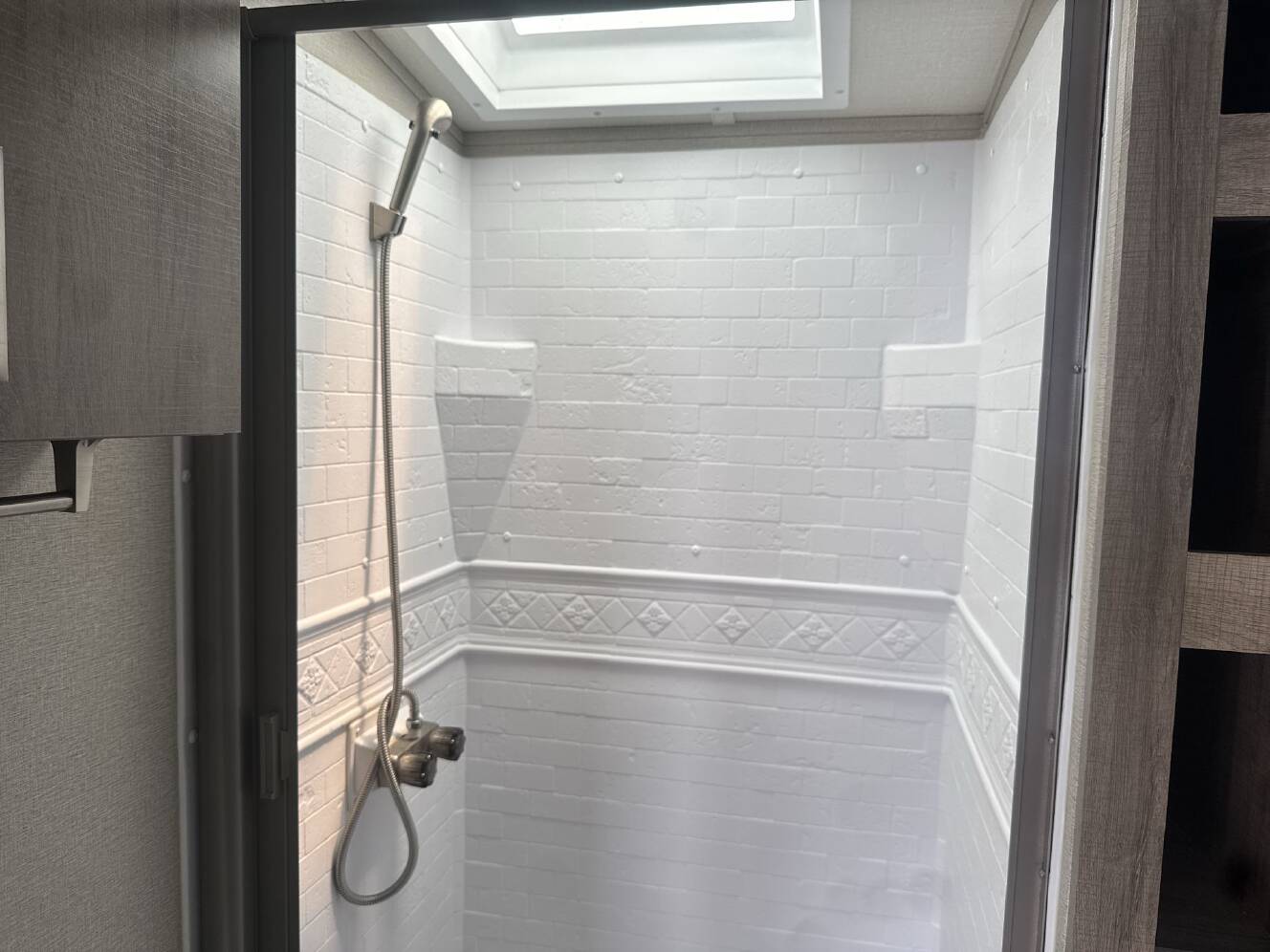 A photo of this 2022 Grand Design Imagine 2970RL