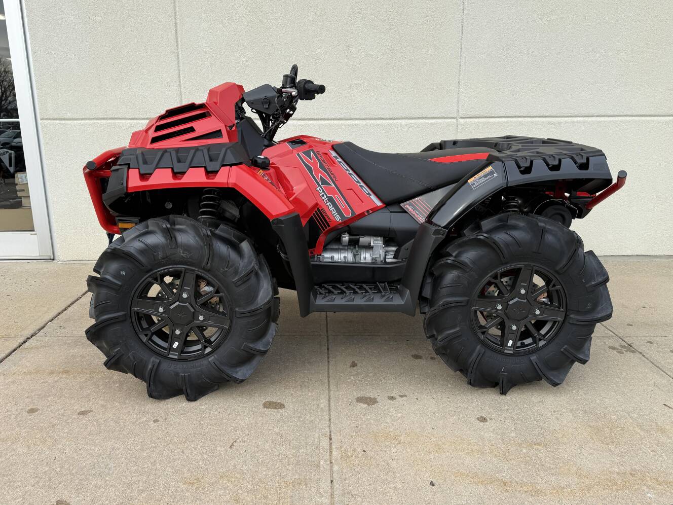 A photo of this 2026 Polaris Sportsman XP 1000 Mud Edition