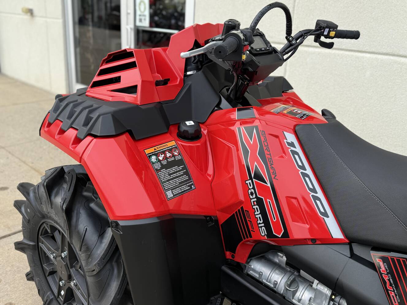 A photo of this 2026 Polaris Sportsman XP 1000 Mud Edition