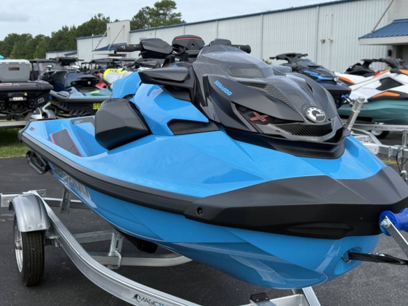 A photo of this 2026 Sea-Doo RXP-X 325 Tech, BRP Premium A, iBR Gulfstream Blue P