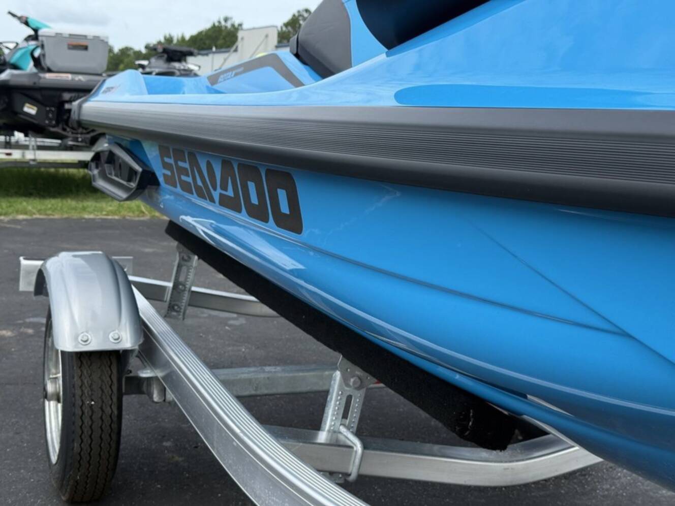 A photo of this 2026 Sea-Doo RXP-X 325 Tech, BRP Premium A, iBR Gulfstream Blue P