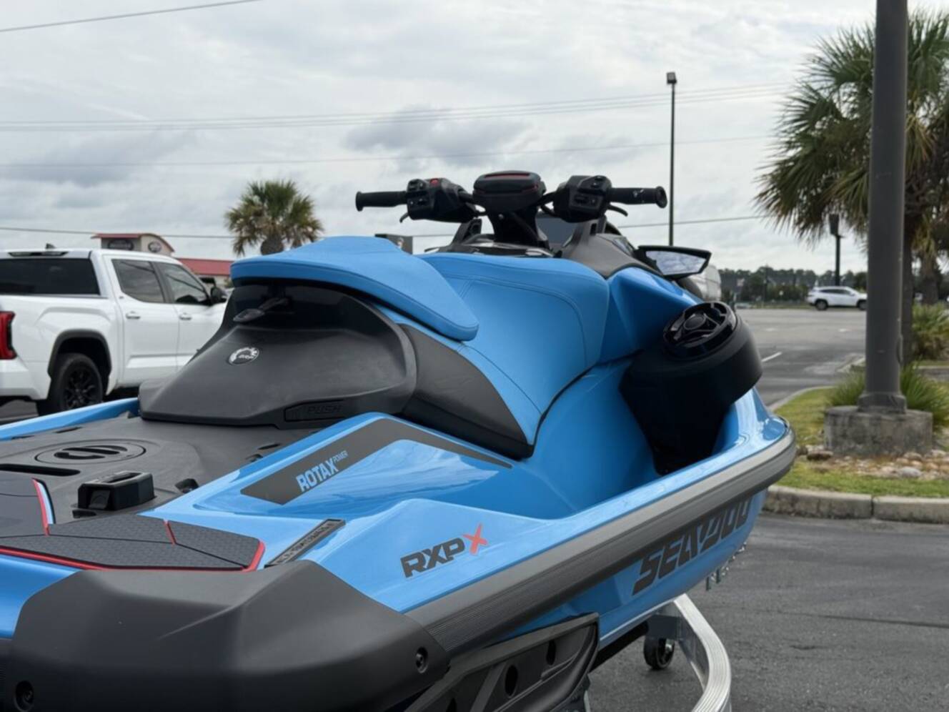 A photo of this 2026 Sea-Doo RXP-X 325 Tech, BRP Premium A, iBR Gulfstream Blue P