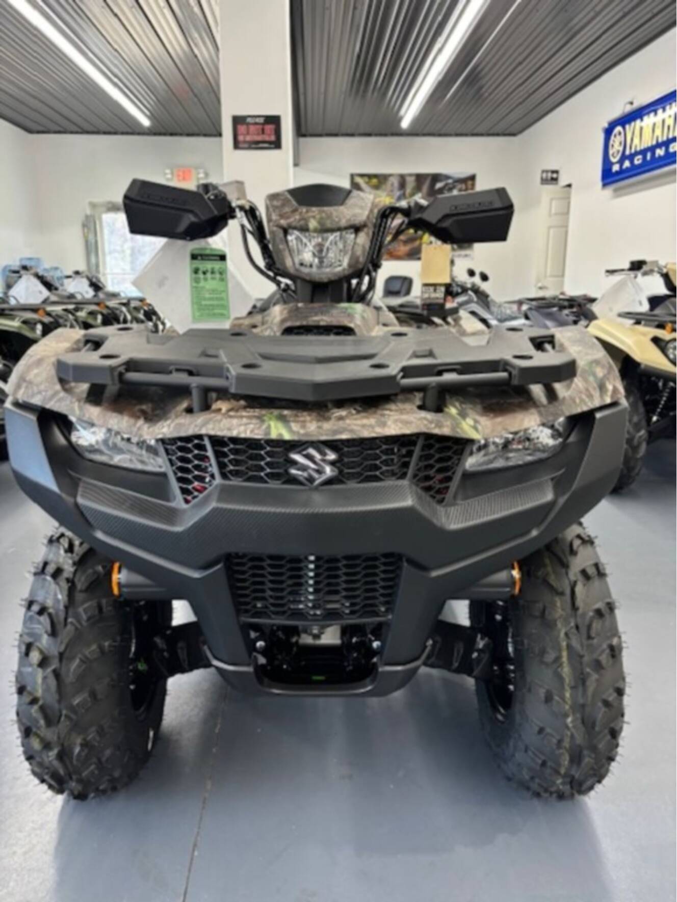 A photo of this 2025 Suzuki KingQuad 500AXi Power Steering SE Camo