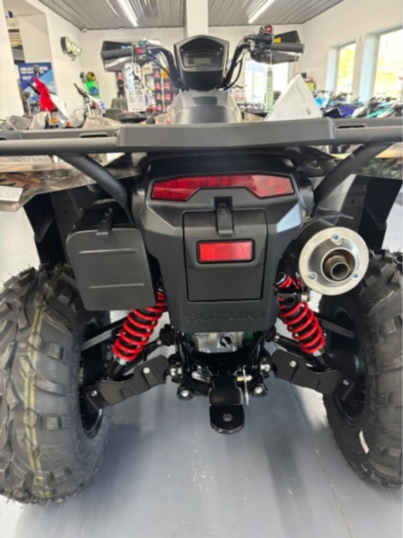 A photo of this 2025 Suzuki KingQuad 500AXi Power Steering SE Camo