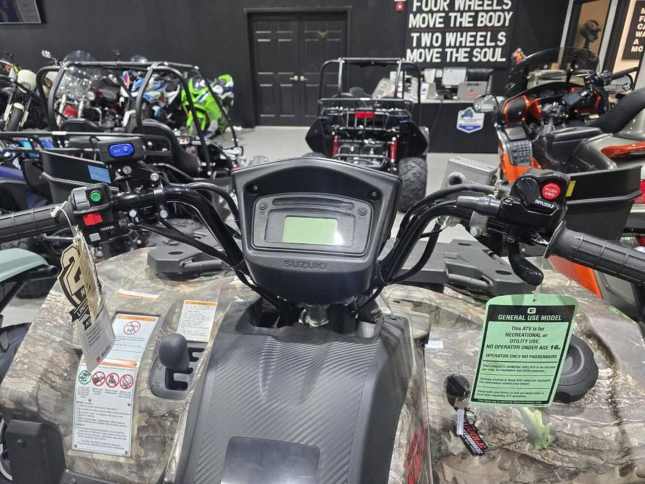 A photo of this 2025 Suzuki KingQuad 500AXi Power Steering SE Camo