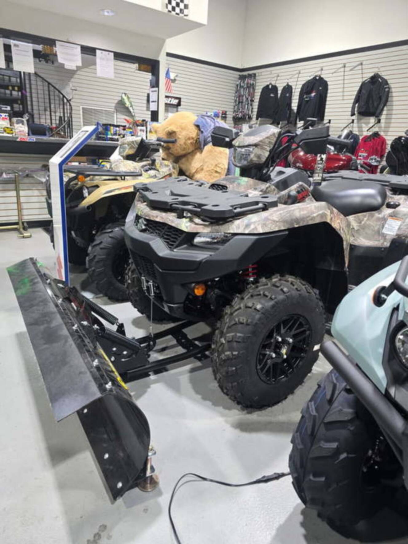 A photo of this 2025 Suzuki KingQuad 500AXi Power Steering SE Camo