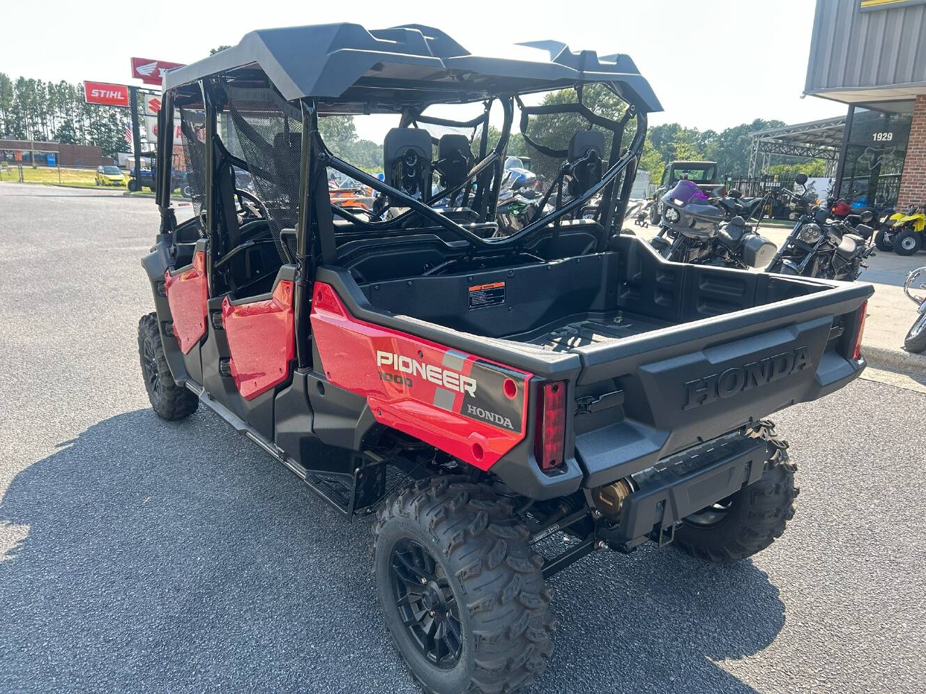 A photo of this 2025 Honda Pioneer 1000-6 Deluxe Crew