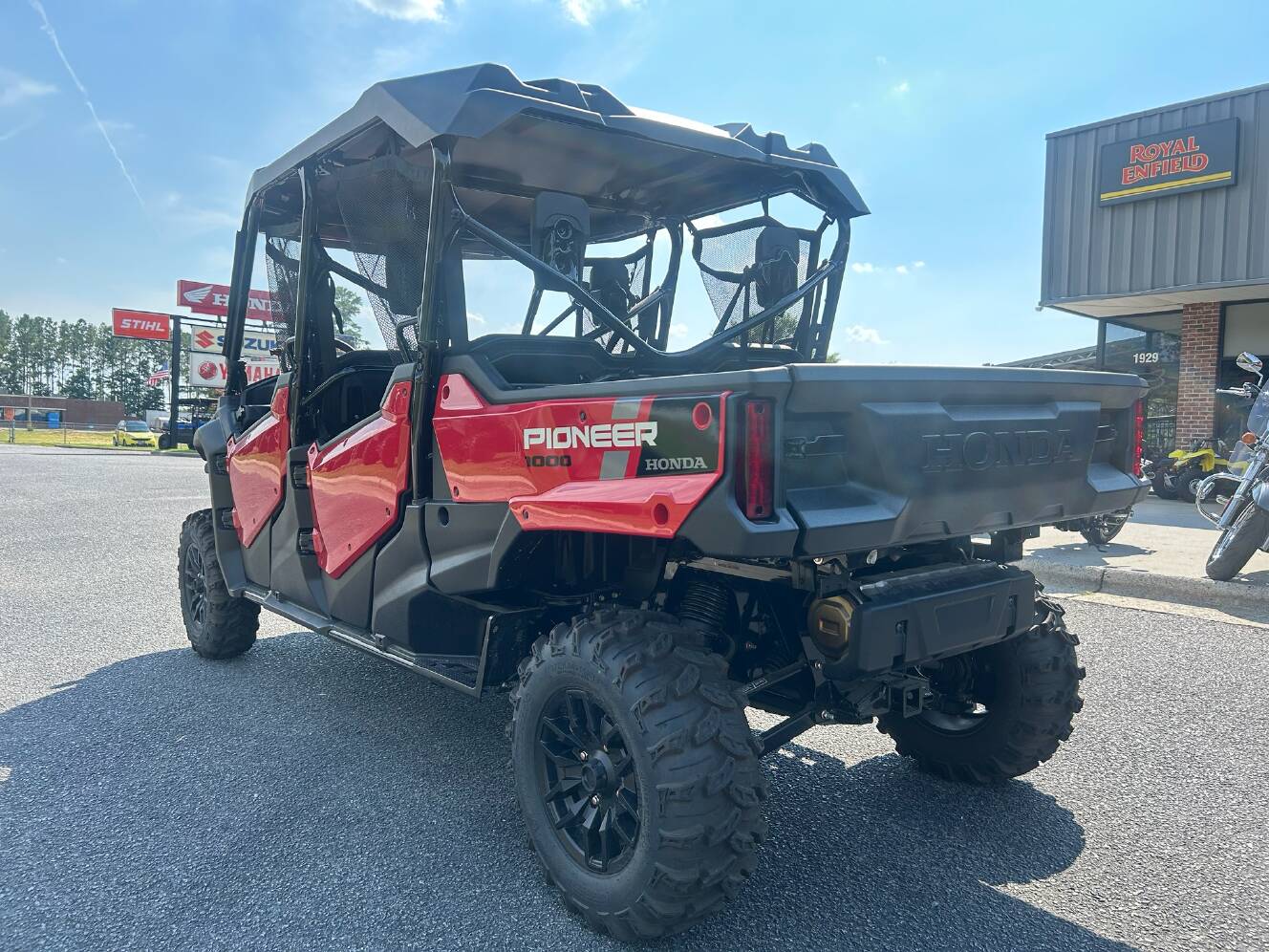 A photo of this 2025 Honda Pioneer 1000-6 Deluxe Crew