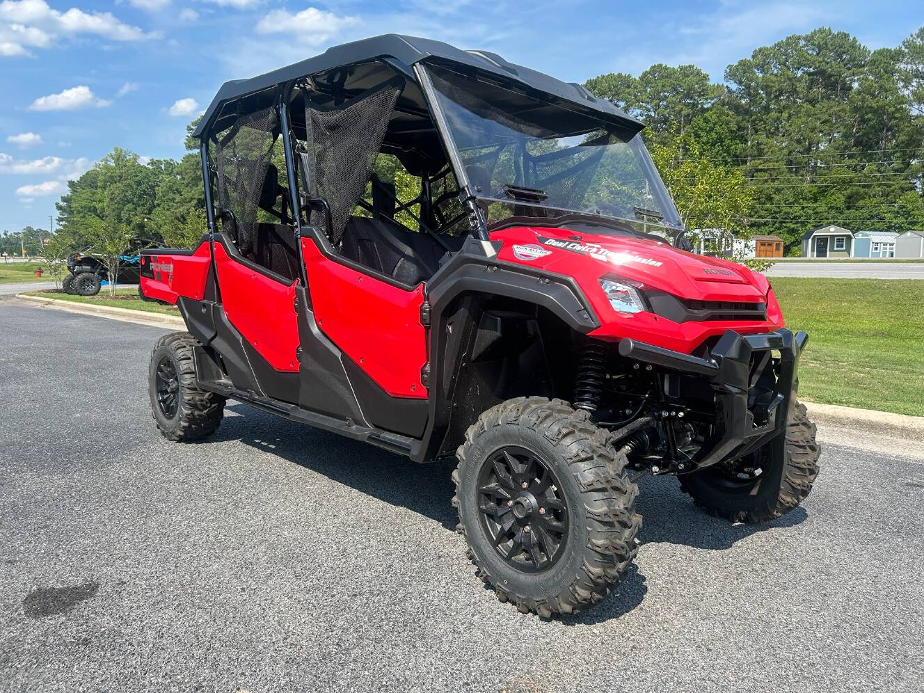 A photo of this 2025 Honda Pioneer 1000-6 Deluxe Crew