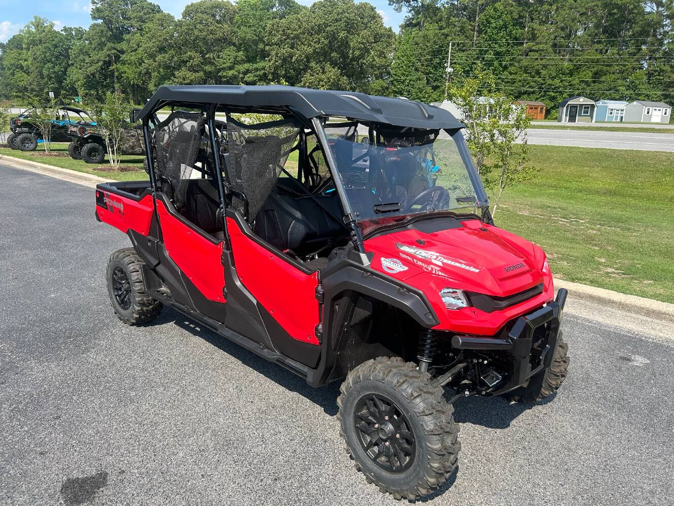 A photo of this 2025 Honda Pioneer 1000-6 Deluxe Crew