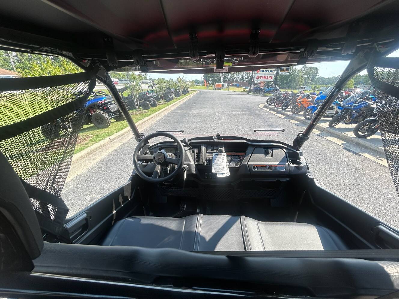 A photo of this 2025 Honda Pioneer 1000-6 Deluxe Crew
