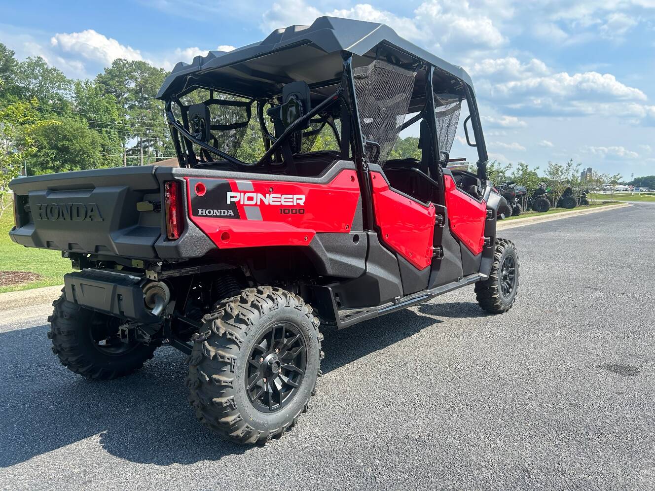A photo of this 2025 Honda Pioneer 1000-6 Deluxe Crew