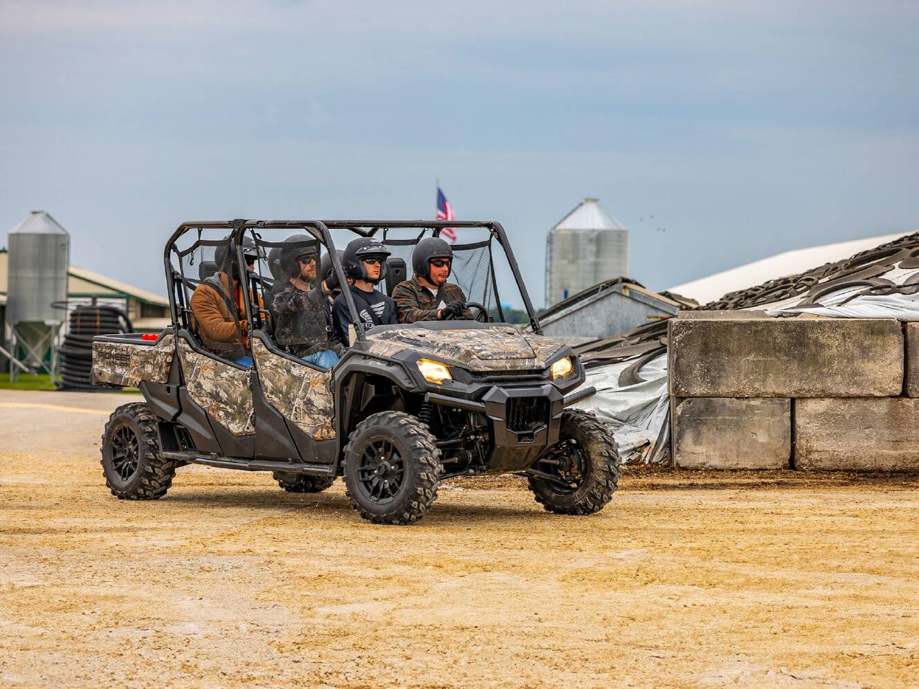 A photo of this 2025 Honda Pioneer 1000-6 Deluxe Crew
