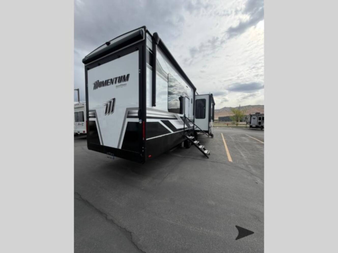 A photo of this 2025 Grand Design Momentum 395MS