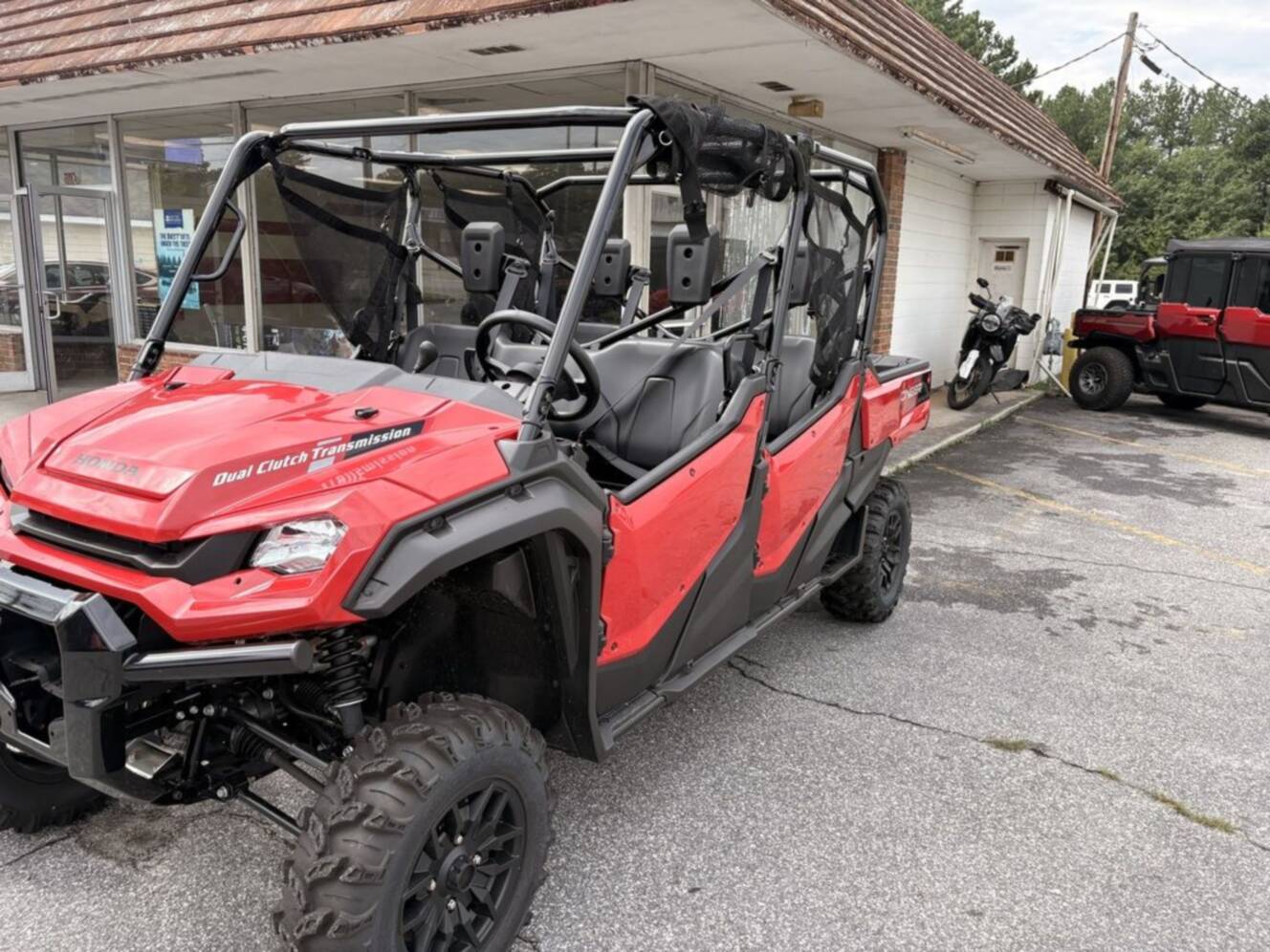 A photo of this 2025 Honda® Pioneer 1000-6 Deluxe Crew