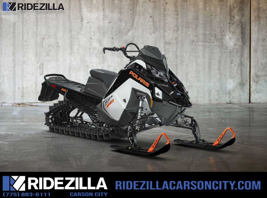 2027 Polaris® 650 RMK SP 155 ES White Lightning / Gloss Black / Orang 650 155 ES in carson city NV