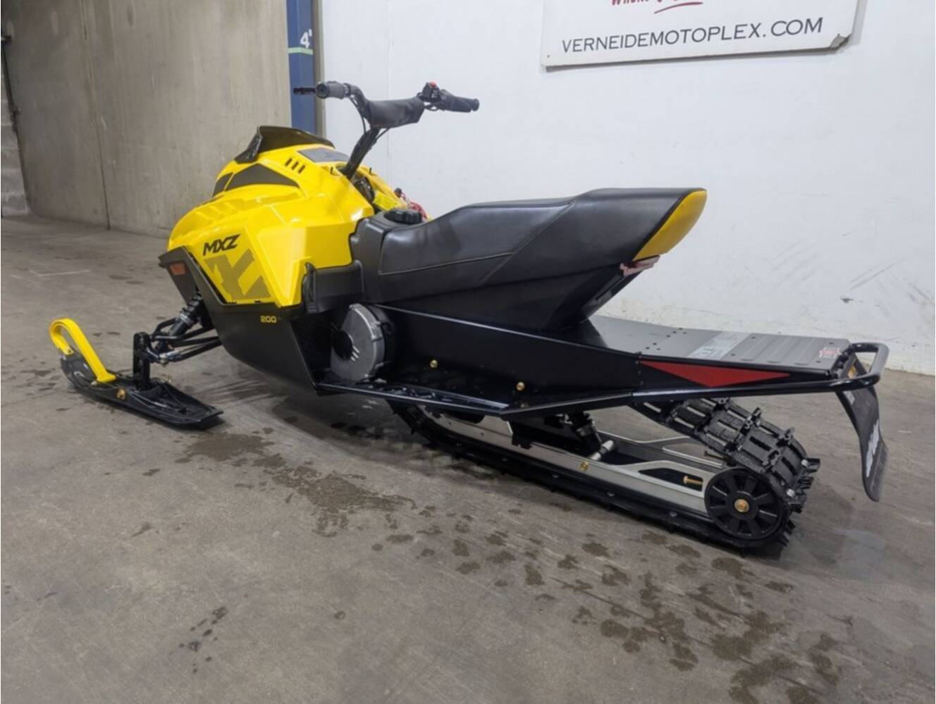 A photo of this 2027 Ski-Doo MXZ 200 200 cc 93 ES S_Lev_Yllw