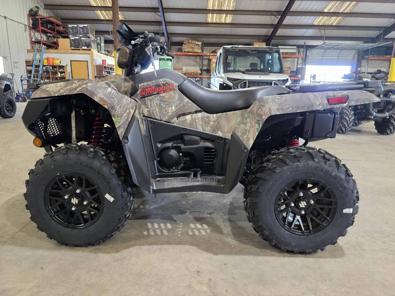 A photo of this 2025 Suzuki KingQuad 500 AXi Power Steering SE Camo