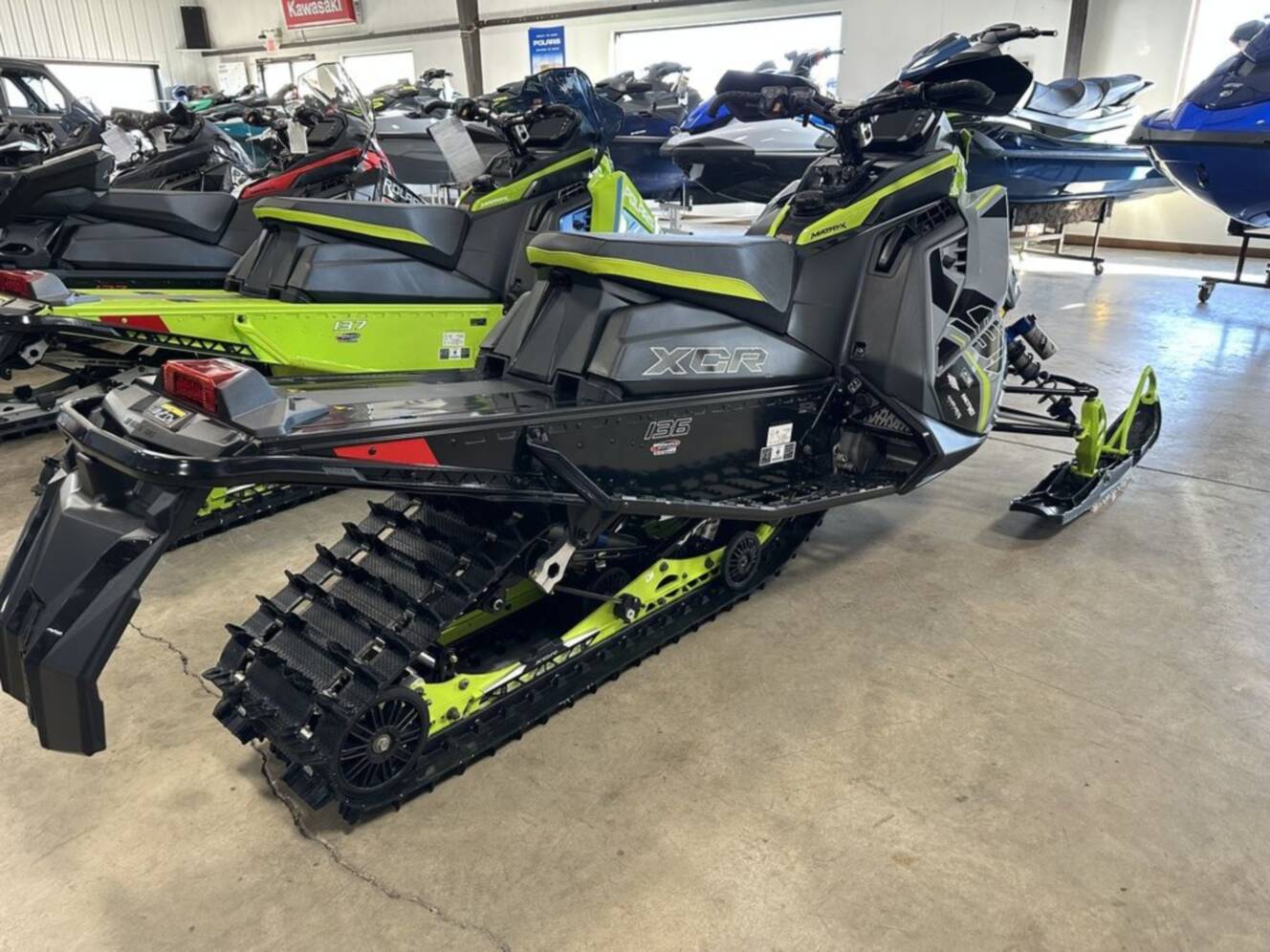 A photo of this 2025 Polaris® Patriot 9R Indy XCR 136 Storm Gray / Neon