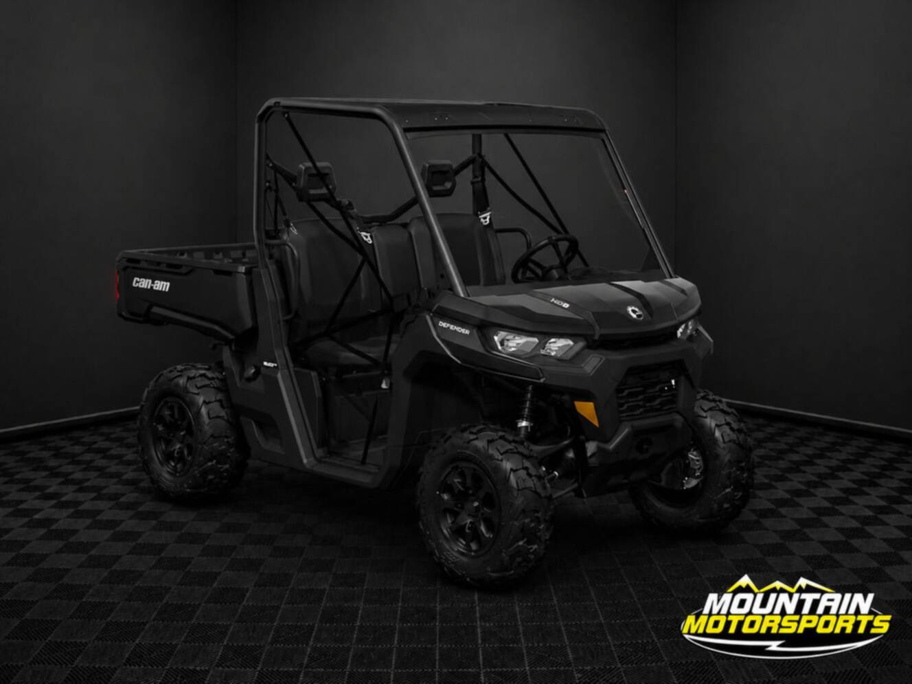 A photo of this 2026 Can-Am Defender DPS HD9 Dark Wildland Camo