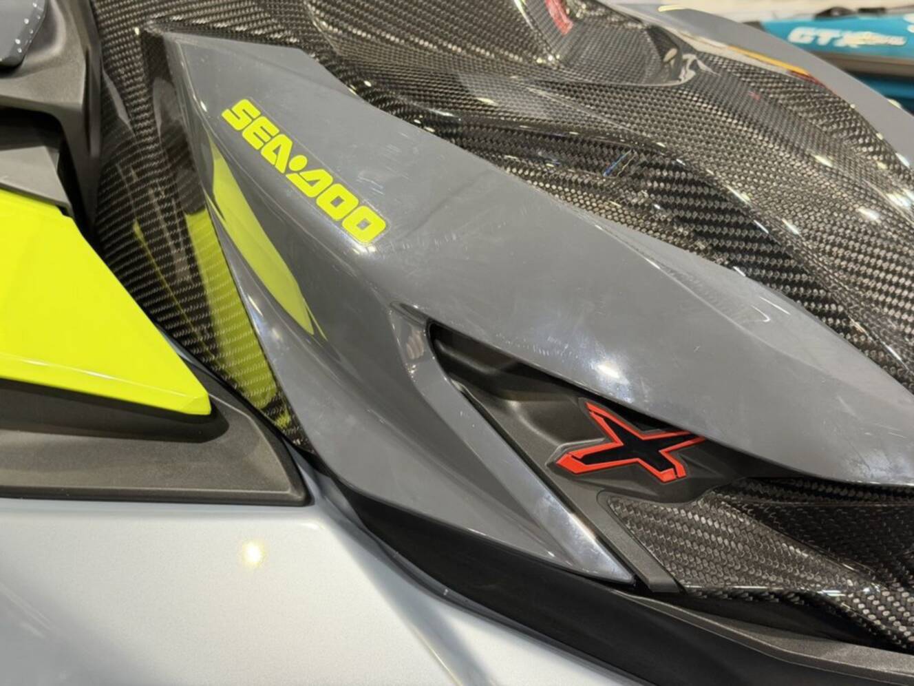 A photo of this 2026 Sea-Doo RXP-X 325 Tech, BRP Premium A, iBR Ice Metal / Manta