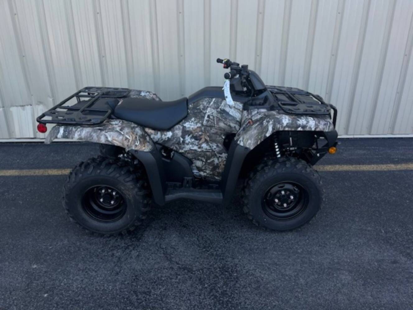 A photo of this 2027 Honda® FourTrax Rancher 4X4 TrueTimber® Atera Camo