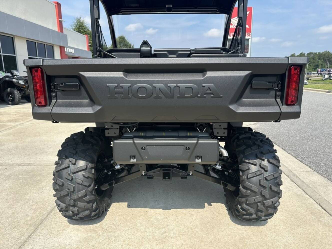 A photo of this 2026 Honda® Pioneer 1000 Deluxe TrueTimber atera camo